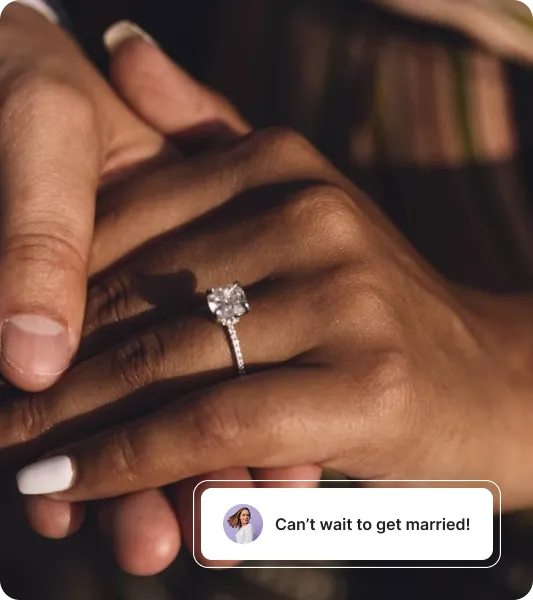 A close-up of a hand wearing a sparkling engagement ring, gently held by another hand, symbolizing an upcoming marriage.