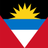 Flag of Antigua and Barbuda, with an inverted red isosceles triangle on the bottom, black at the top containing a rising yellow sun, followed by horizontal blue and white sections beneath it.