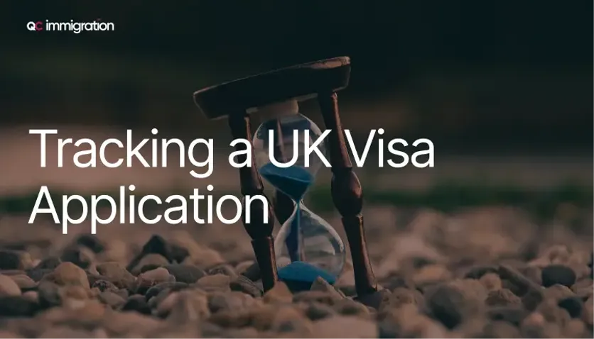 Hourglass on a sandy surface representing waiting period and tracking progress of a UK visa application